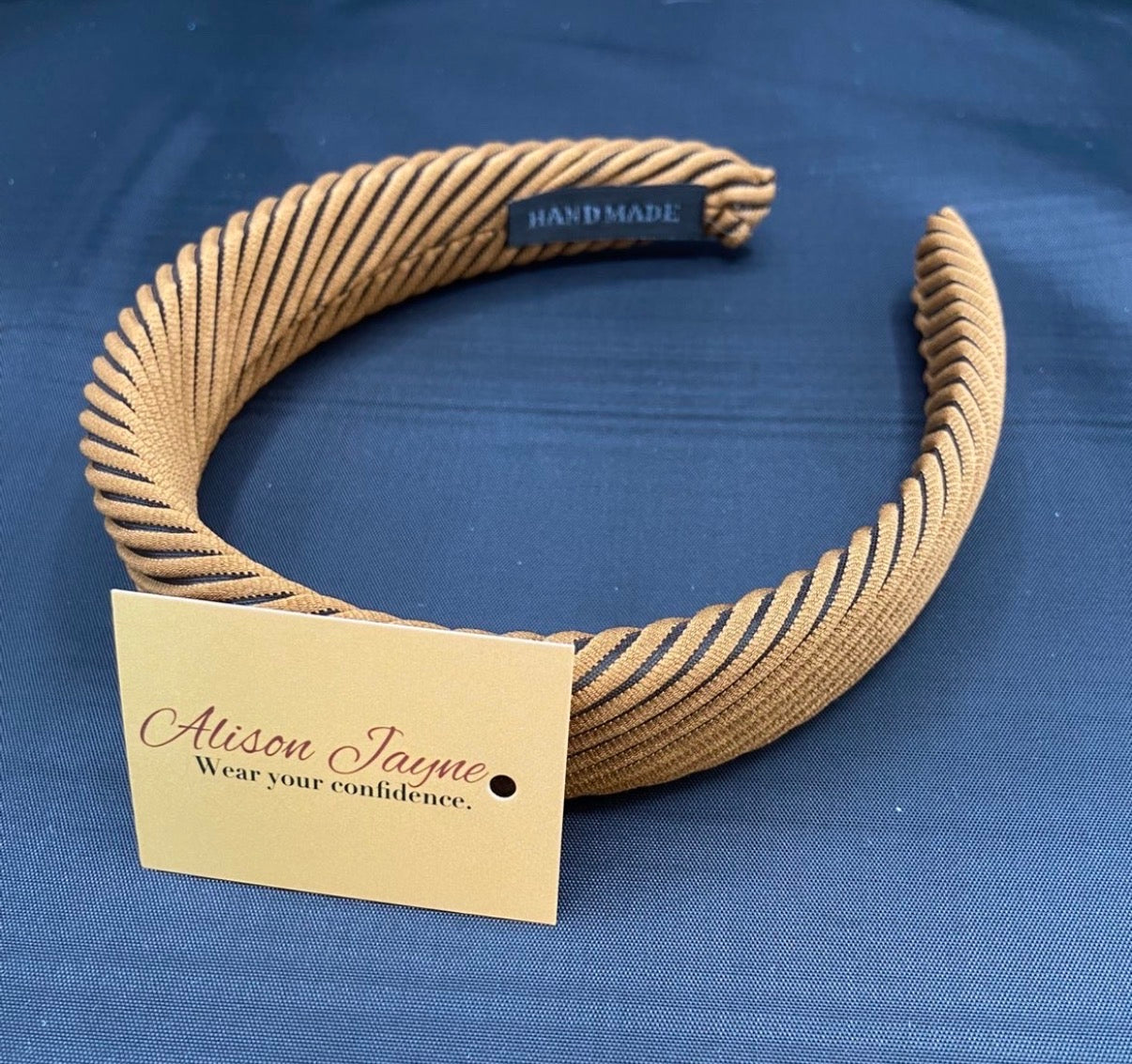 Padded, striped hairband