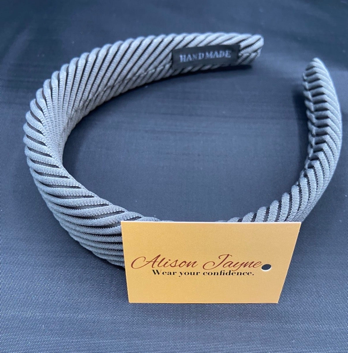 Padded, striped hairband