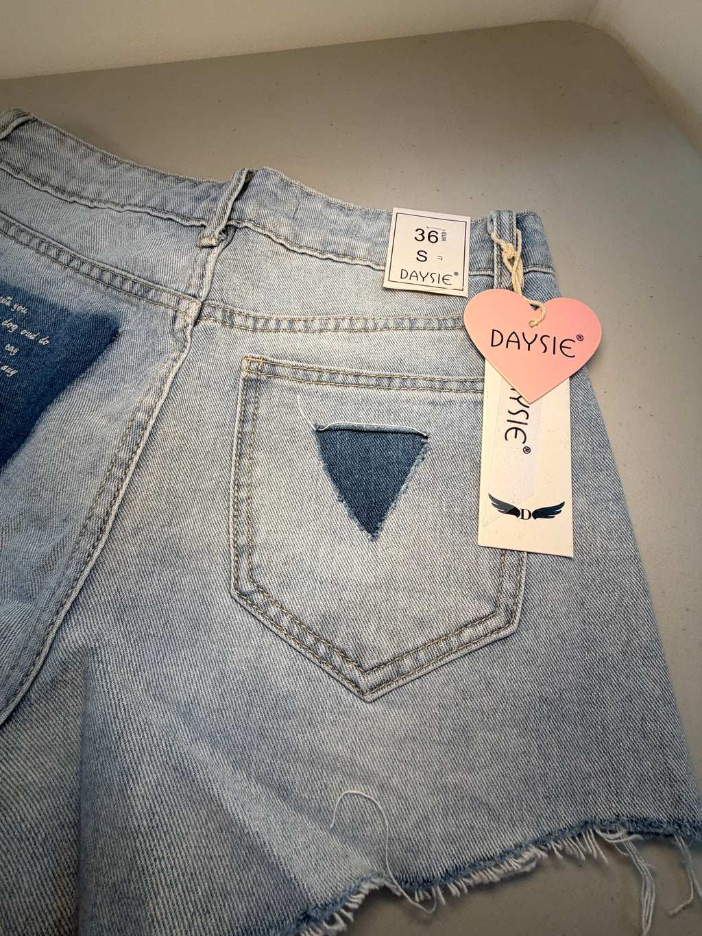 Ripped Denim Shorts with Wording on Pocket