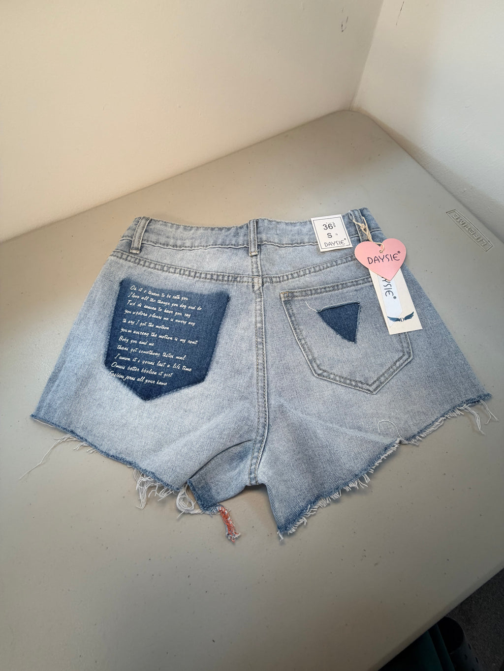 Ripped Denim Shorts with Wording on Pocket