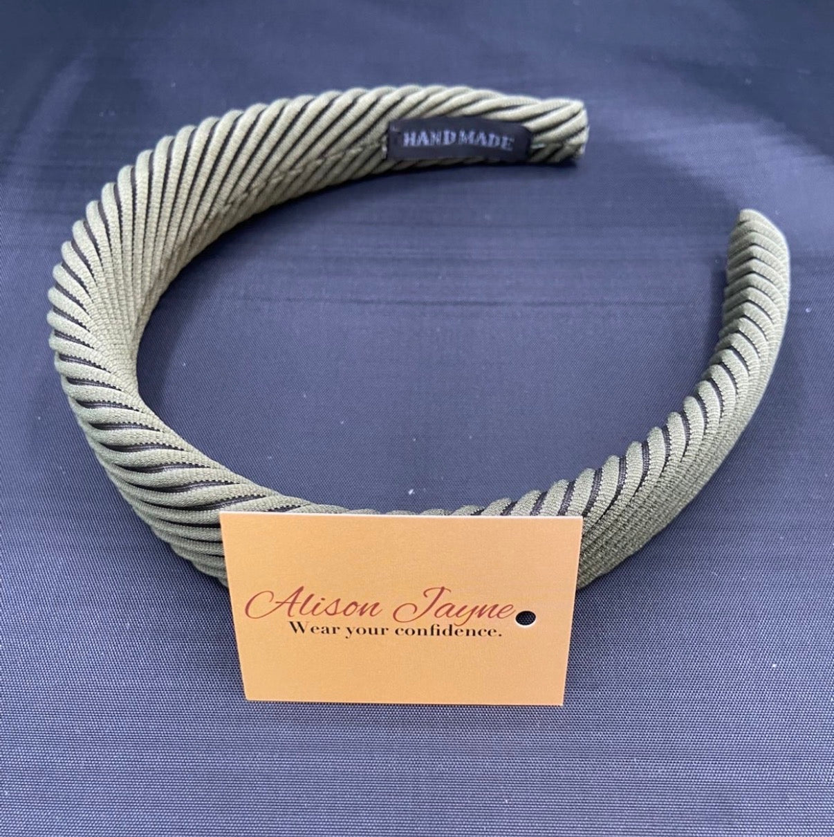 Padded, striped hairband
