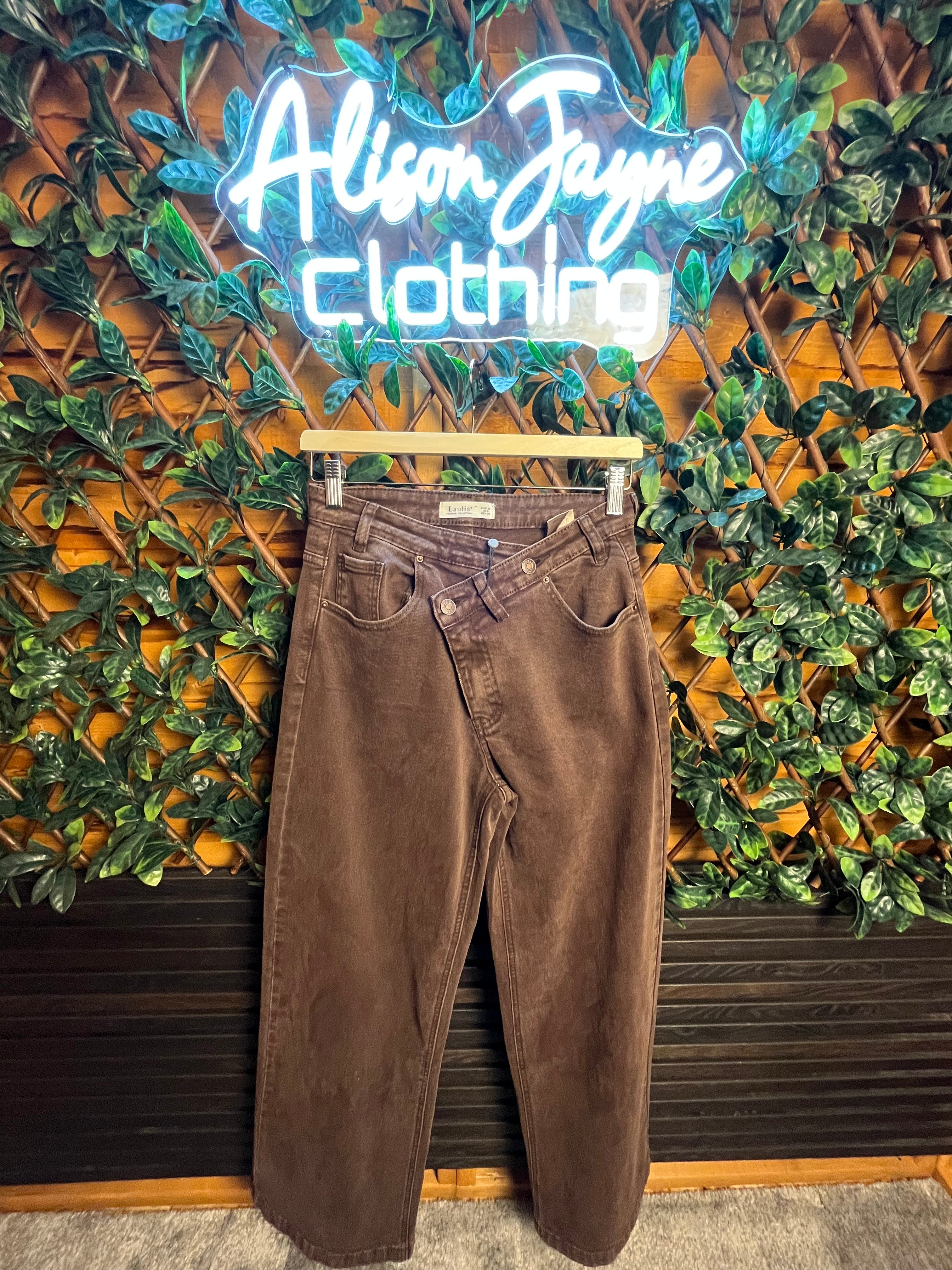 Cross Waistband Jeans- 31 inch inside leg.