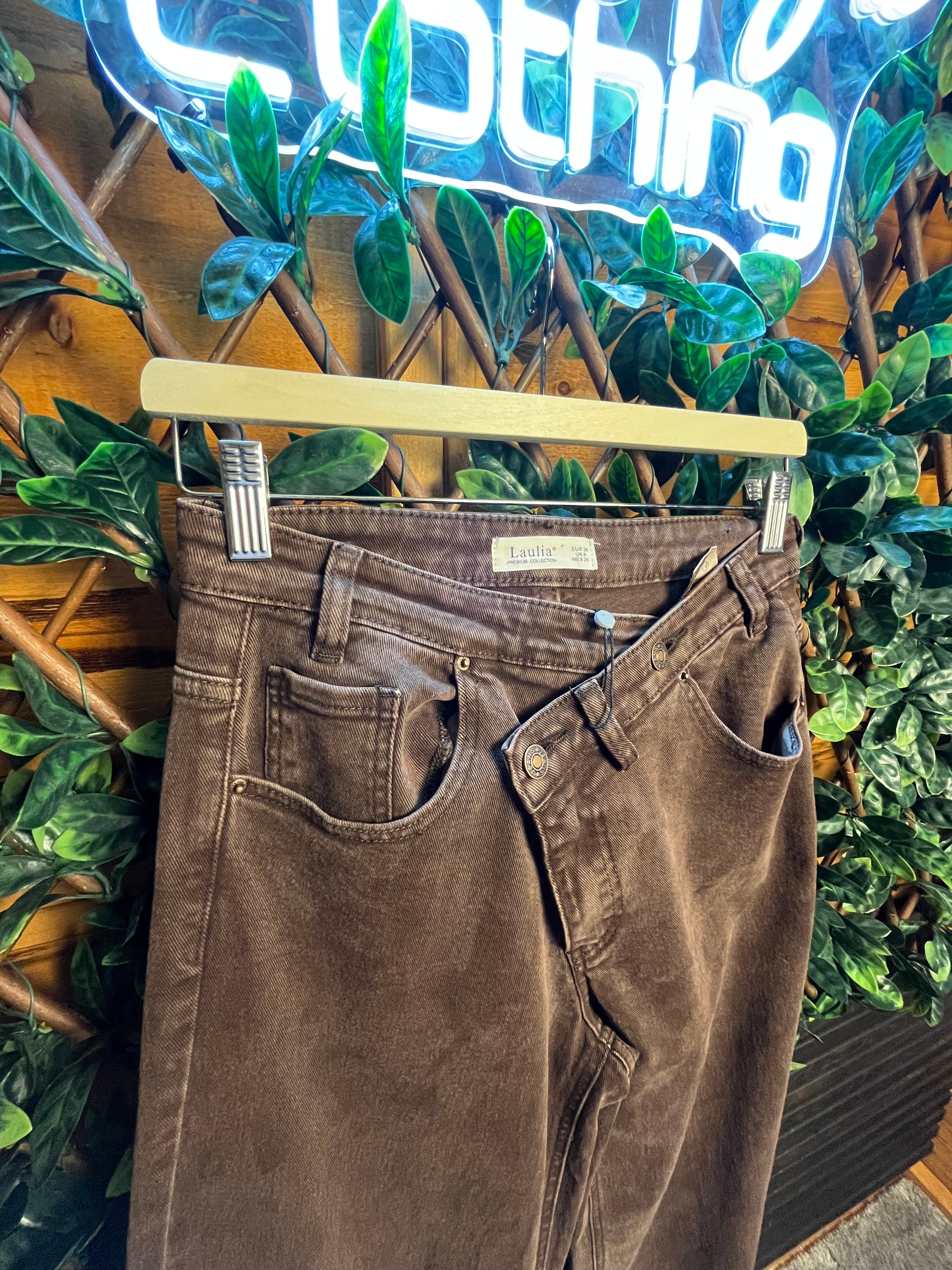 Cross Waistband Jeans- 31 inch inside leg.