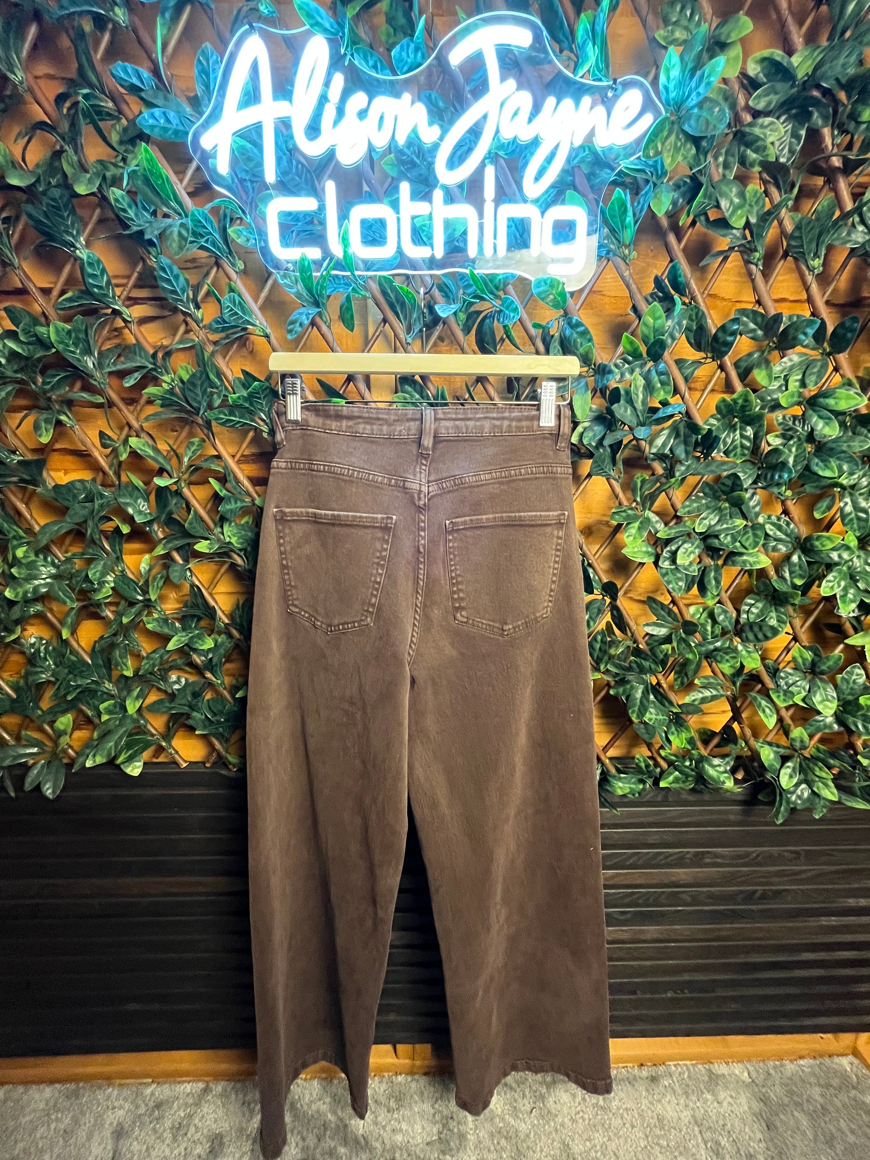 Cross Waistband Jeans- 31 inch inside leg.